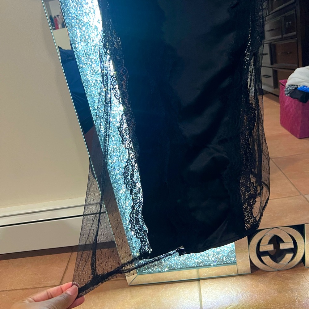 See through lace on the sides and under breast section of dress